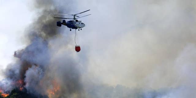 Płoną pożary, ponieważ niektóre części Hiszpanii zmagają się z rekordową falą upałów. 